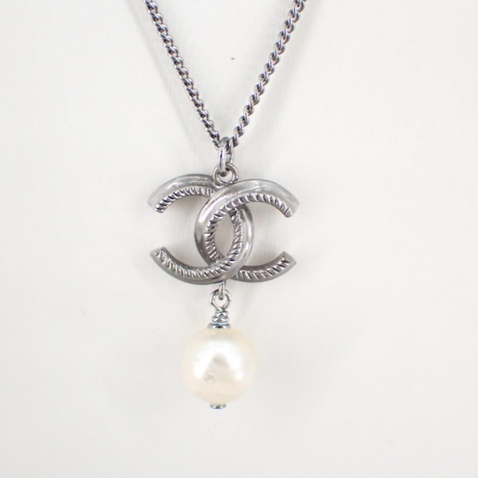 C Gunmetal pearl logo necklace